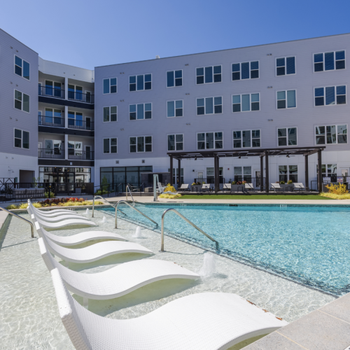 Luxury Apartment Pool with Sun Shelf and Relaxation Seating